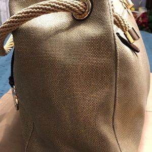 MK gold color shoulder bag